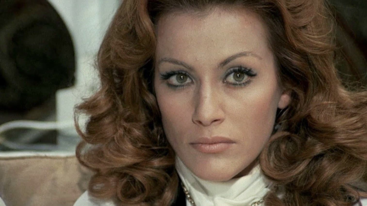 A Lizard in a Woman's Skin Backdrop